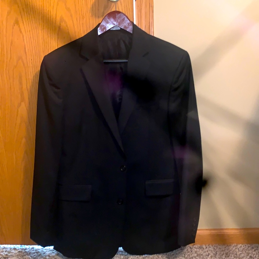 Men’s black Calvin Klein sport coat. Like new. Size Small.